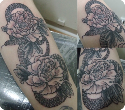 Casie Snake Flower Arm Tattoo