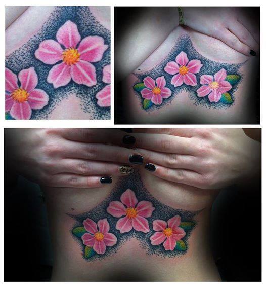 breast flower tattoo